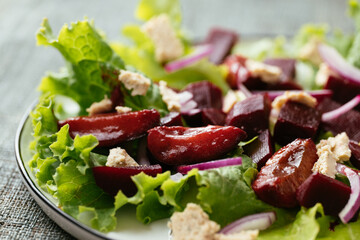 Home made beet and plum salad with vegan feta