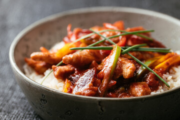 Textured vegetable protein (TVP) with a spicy Chinese plum sauce with bell peppers on rice