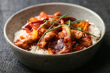 Textured vegetable protein (TVP) with a spicy Chinese plum sauce with bell peppers on rice