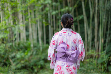 Japanese woman wear yukata at outdoor park