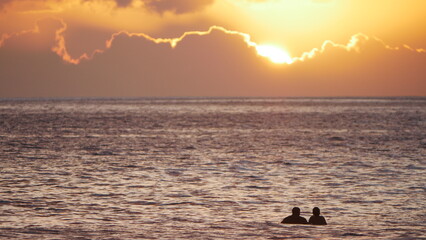 Sunset surfing in Maui Hawaii 7