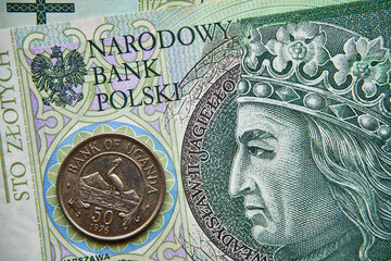 polski banknot,100 PLN ,ugandyjska moneta, Polish banknote, 100 PLN, Ugandan coin