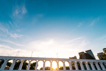 Sun Shines Through Landmark Lapa Arches in Rio de Janeiro City Downtown