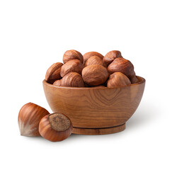 Wooden bowl full of hazelnuts isolated on white. Deep focus