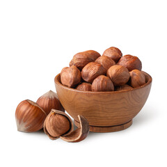 Wooden bowl full of hazelnuts isolated on white. Deep focus