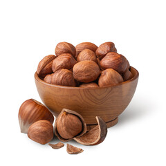 Bowl of hazelnuts with green leaves isolated on white. Deep focus