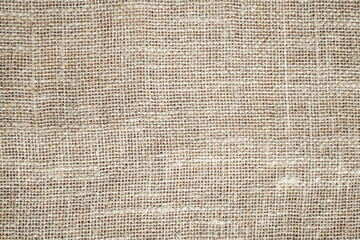 background of a large texture of gray-beige burlap