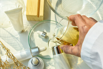 Scientist mixing natural skincare beauty products, Organic botany extraction and scientific...