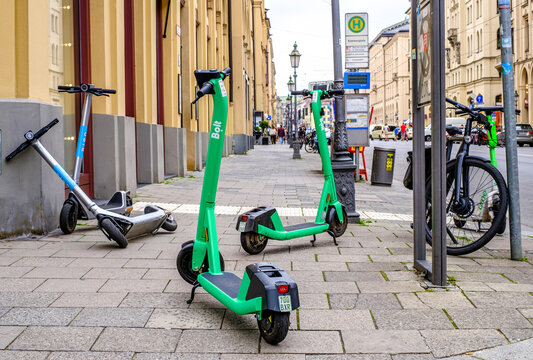 Munich, Germany - June 5: typical modern eScooters at a street in the old town of Munich on June 5, 2022