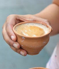Person holding a Tea Cup