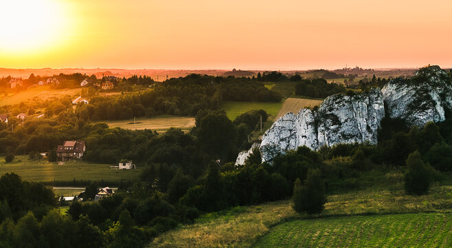 Sunset over the village near the limestone rocks.