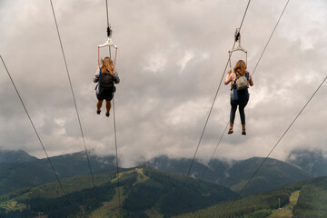 Descent on a zipline in the mountains