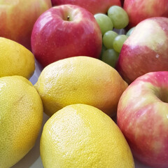 Lemons and apples. Ripe and juicy fruit. Vegetarian healthy natural food and ingredients for eating