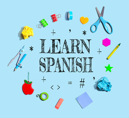 Learn Spanish theme with school supplies overhead view - flat lay