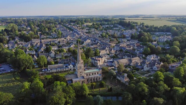 Aerial Drone View of Cotswolds Village and Burford Church in England, a Popular English Picturesque Tourist Destination in the Countryside of Gloucestershire
