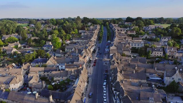 UK Housing Market, Aerial Drone View of Houses in Village of Burford in Cotswolds, England, a Popular English Picturesque Tourist Destination in Gloucestershire