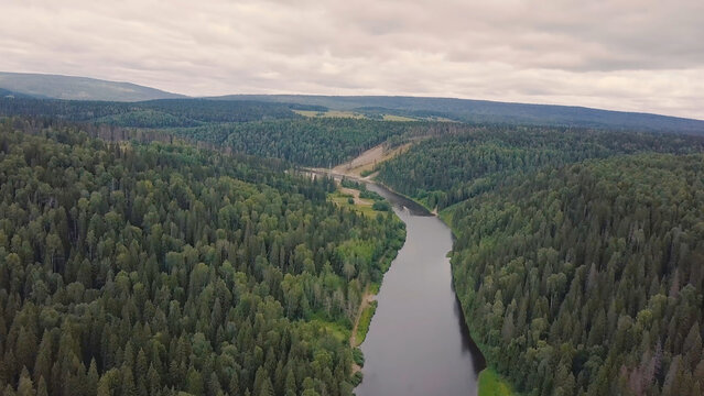 Gorgeous aerial panoramic view on the touristic part of the river at sunset. Clip. Beautiful natural landscape at summer. Europe