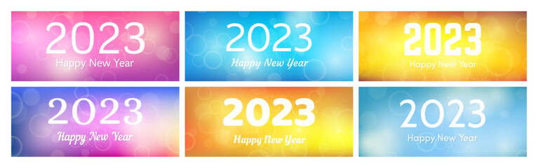 Happy new year 2023 incription on blurred background