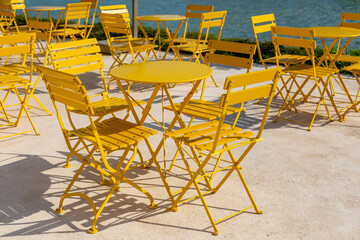 Yellow colored garden table and chairs