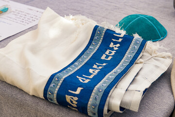 A Captivating Photo of a Jewish Kippah on a Traditional Jewish Scarf