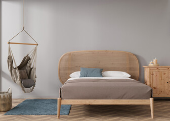 Empty gray wall in modern bedroom. Mock up interior in scandinavian, boho style. Free, copy space for your picture, text, or another design. Bed, rattan basket, hanging armchair. 3D rendering.