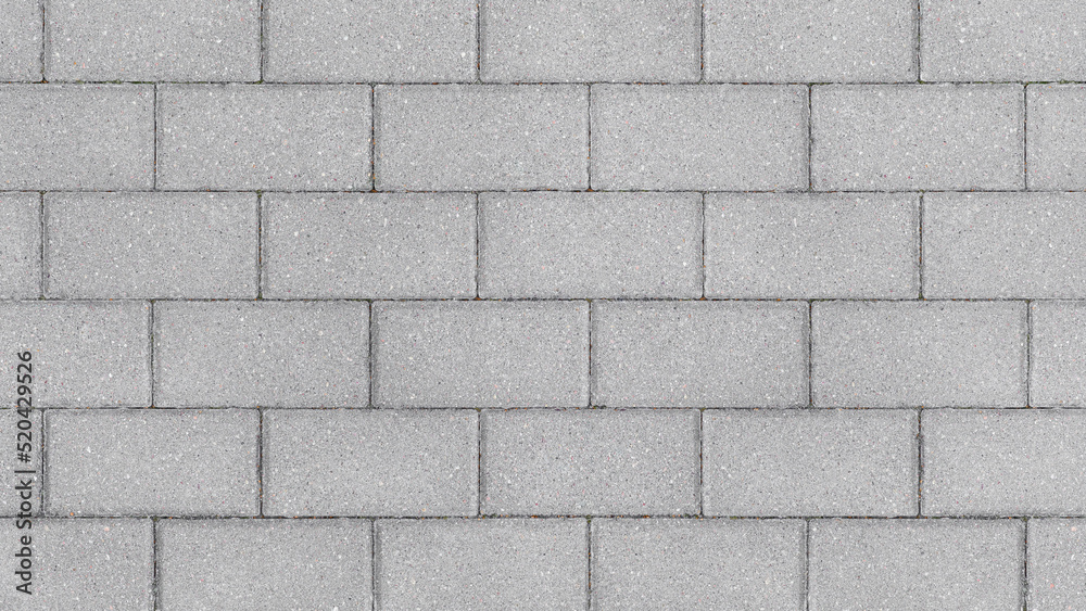 Poster Grey brick wall background close up. Gray stone tile block background with horizontal texture of gray brick. Gray brick surface.