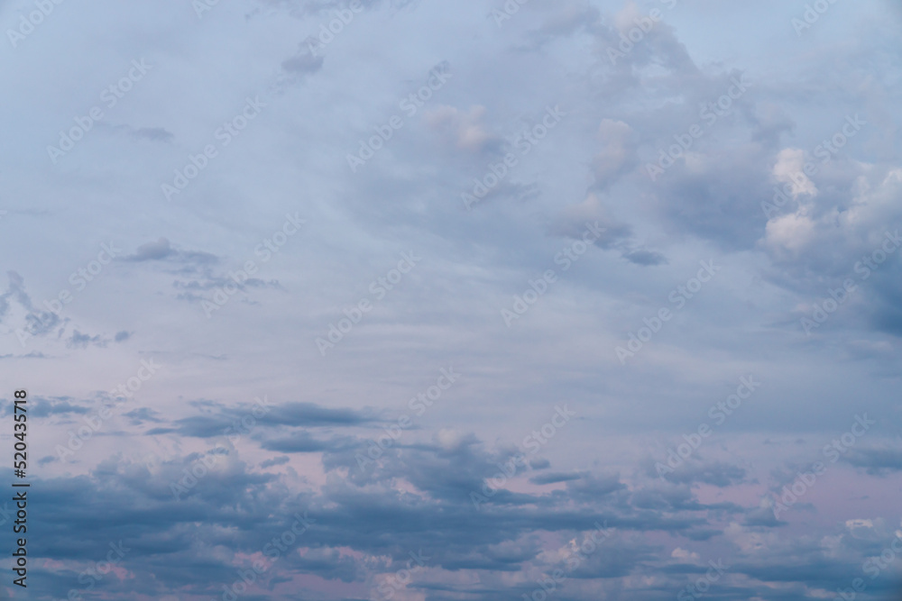 Wall mural beautiful high resolution sunset sky replacement background with a layer of low lying cumulus clouds