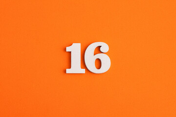 Number 16 - On orange foam rubber background