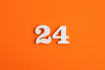 Number 24 - On orange foam rubber background