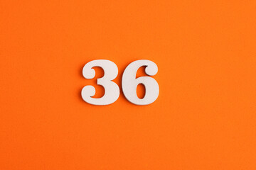 Number 36 - On orange foam rubber background