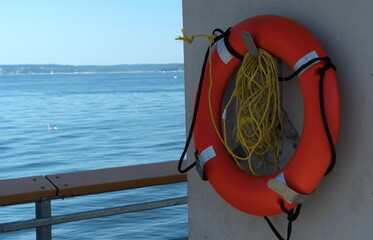 Fototapeta premium Lifesaver haingin in shades at Edmonds Fishing Pier