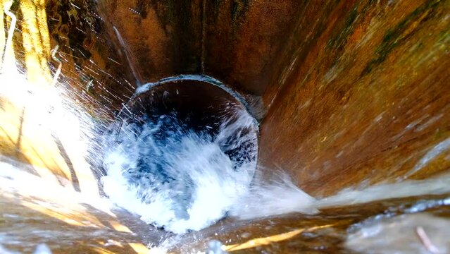 Flood after the rain is flowing down to storm water drainage