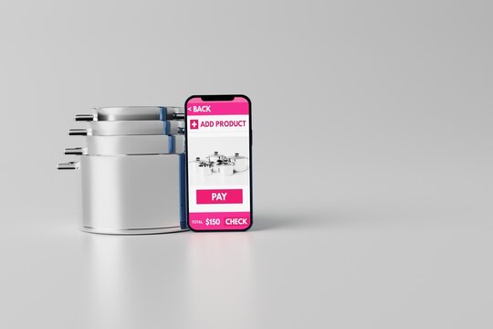 A phone with an application to buy on a background of steel pots. Online sales, e-commerce. Ordering products via the Internet. 3d rendering, 3d illustration.
