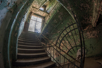 An abandoned old factory made of red bricks - a spinning mill in Poland