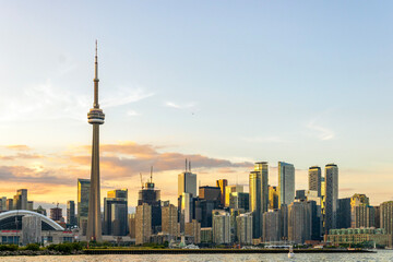 Fototapeta premium Downtown Toronto skyline with CN Tower and skyscrapers at sunset