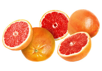 Tasty ripe grapefruits falling on white background