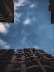 blue sky view of between buildings