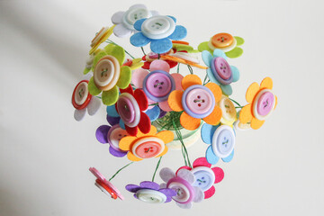 decorative flowers made of multicolored buttons
