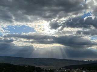 Obraz premium Let it shine - clouds with sunrays