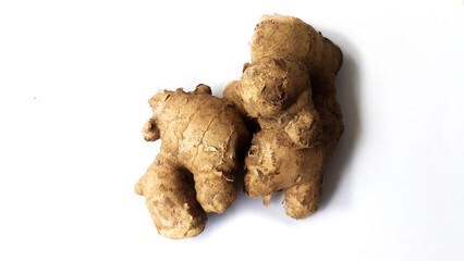 Ginger on a isolated white background. Top view photo angel for food and drink ingredients