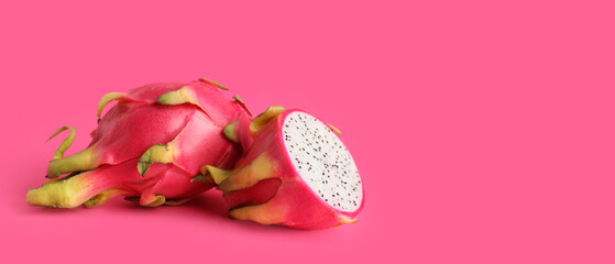 Tasty dragon fruit on pink background