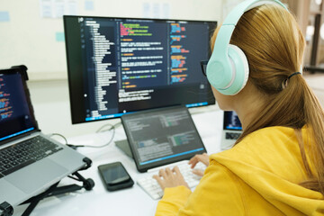 Close up programmer is coding and programming software.