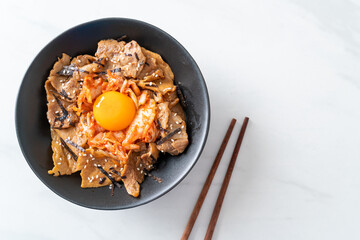 pork bulgogi rice bowl with kimchi and Korean pickled egg