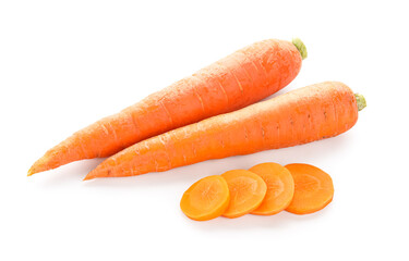 Fresh carrots and cut pieces on white background