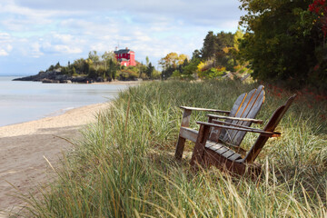 Adirondack chairs on the shore of Lake Superior in Marquette, Michigan