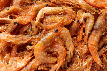 Shrimp fritters, deep fried small shrimp on the table. Battered and deep fried small shrimp, Thai style food.