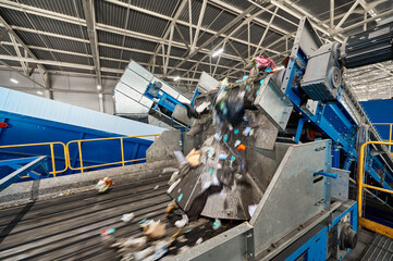 Production line with conveyors at waste recycling plant