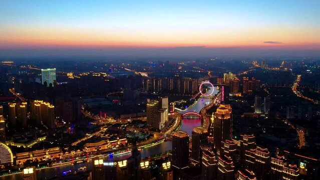 Aerial photography of the coast of Haihe River and Tianjin Eye Ferris wheel in Tianjin, China