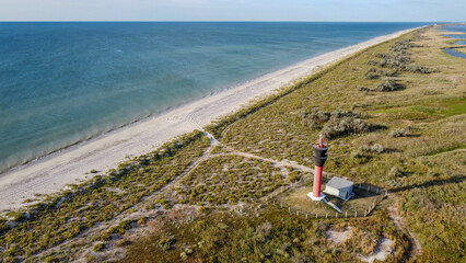 lighthouse on the seashore long sandy coastline, Ukraine, Odessa region