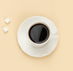 Coffee cup with saccharin pills.